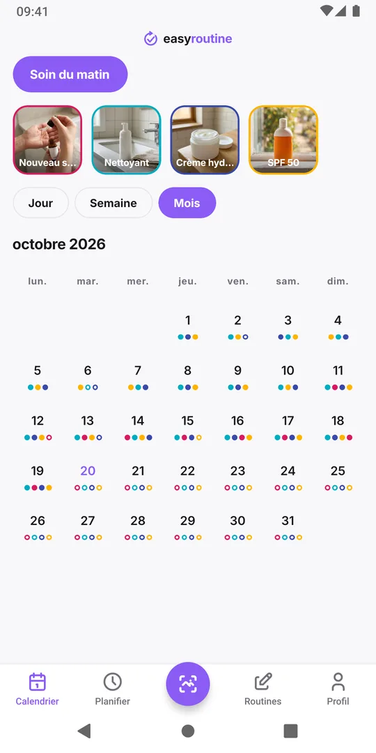 Vue mois d'EasyRoutine où un nouveau point rose pour le nouveau sérum apparaît dans la deuxième moitié du mois à côté des points quotidiens du nettoyant, de la crème hydratante et du SPF