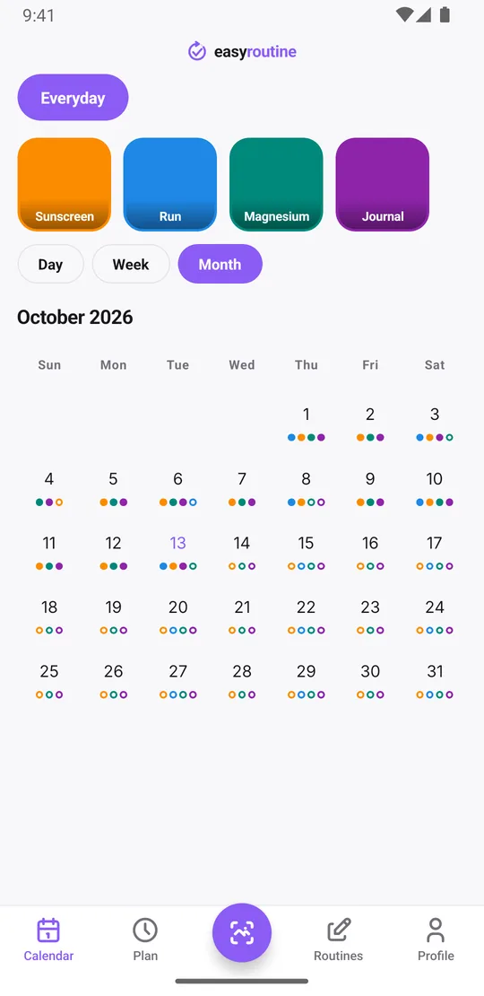EasyRoutine month view with colored dots on each day for sunscreen, runs, magnesium and journaling