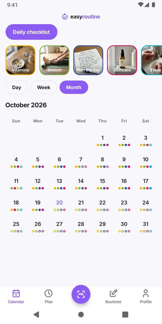 EasyRoutine month view with colored dots on each day for the activities logged that day